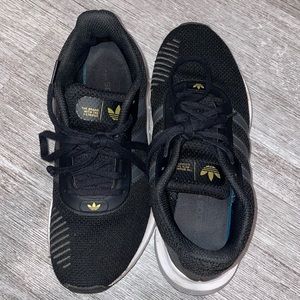 Black adidas sneakers